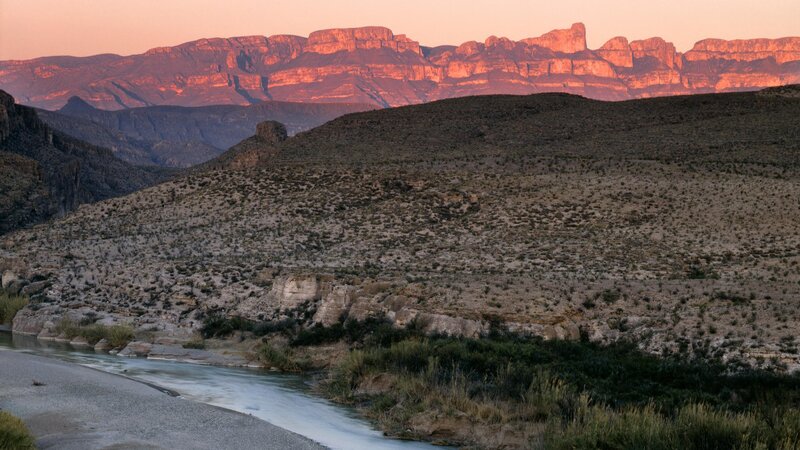 river at sunset in desert canyon