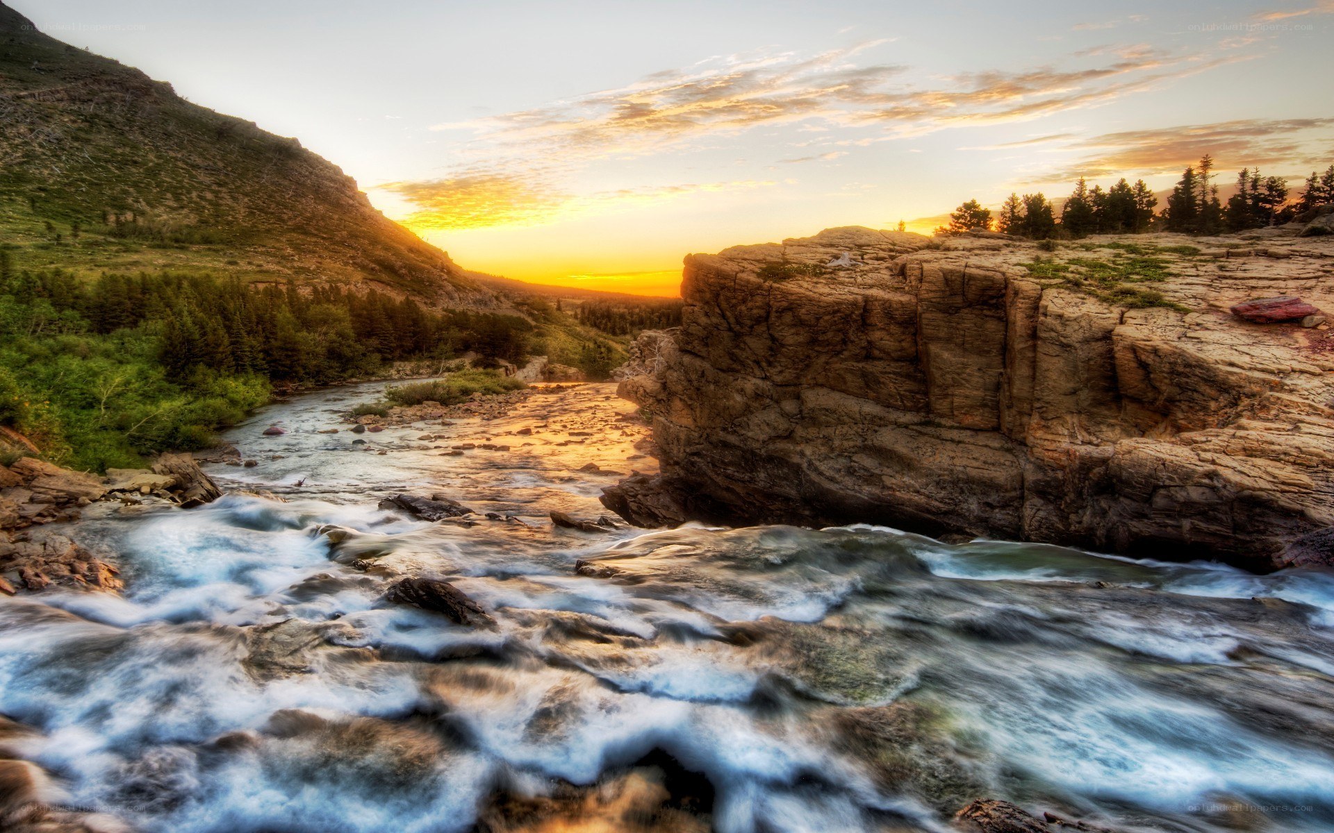 River at sunset in mountain valley