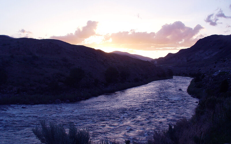 river at sunset in mountain valley