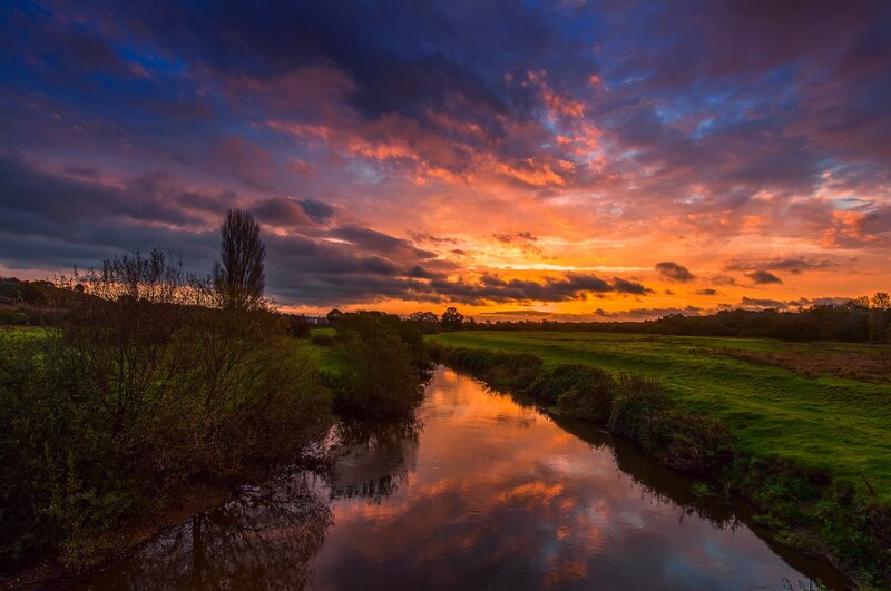 River at Sunset — Orange, Dramatic, Photograph, Sky, Clouds, Field
