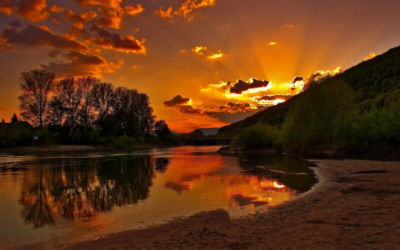 River at Sunset — Orange, Dramatic, Photograph, Trees, Clouds, Bridge