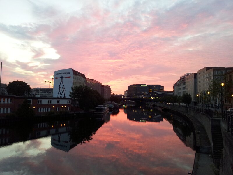 River at Sunset — Pink, Serene, Photograph, Buildings