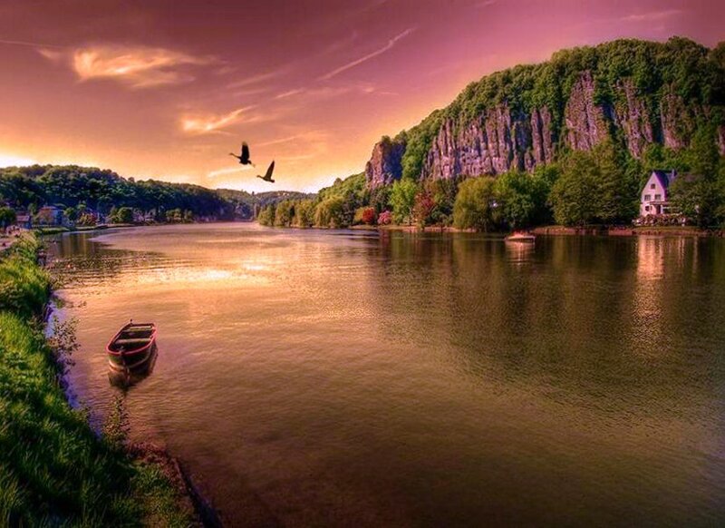 River at sunset with birds