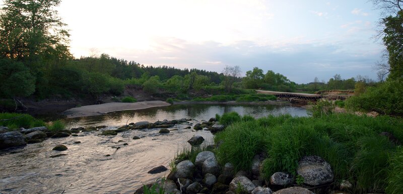 River at sunset with bridge