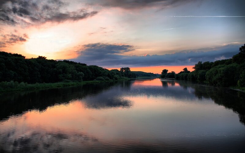 River at sunset with colorful sky