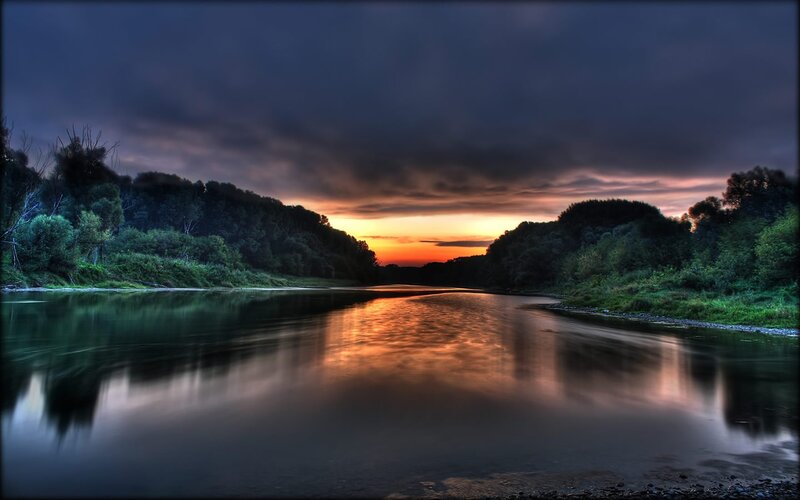 River at sunset with forest