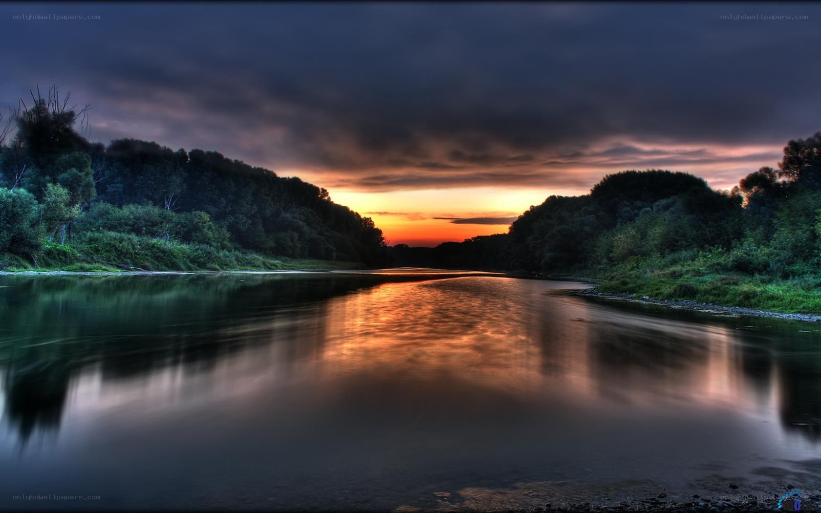 River at sunset with forest