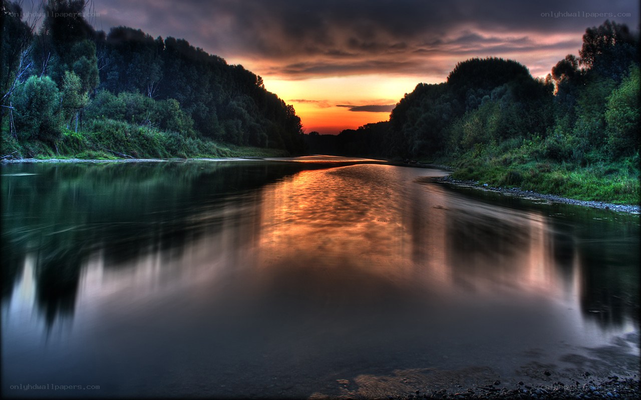 River at sunset with forest