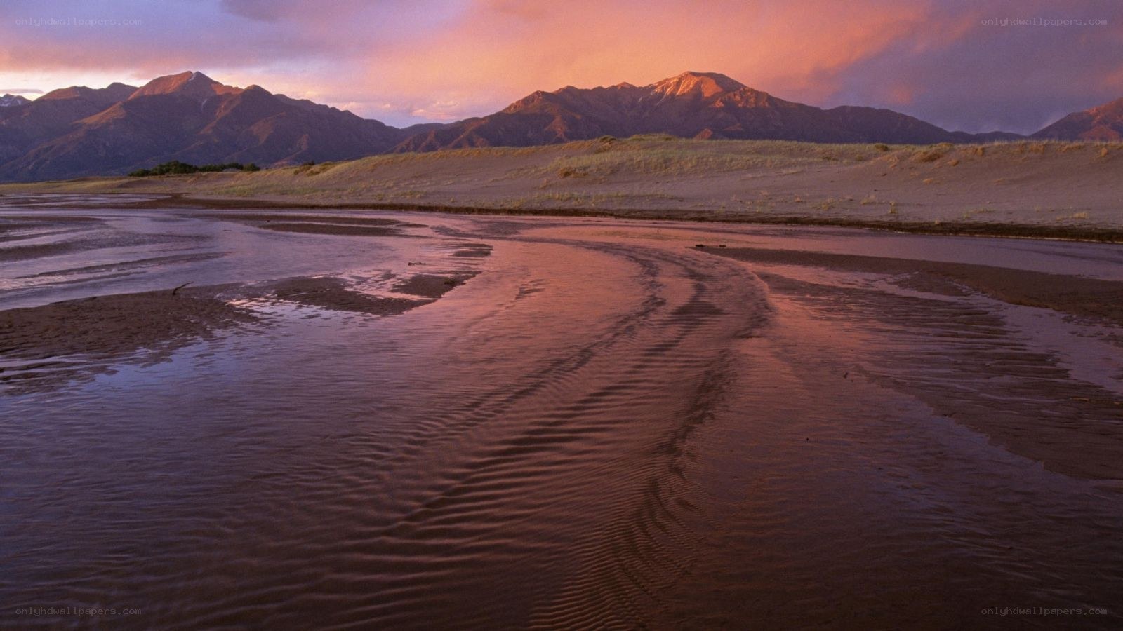 river at sunset with mountains