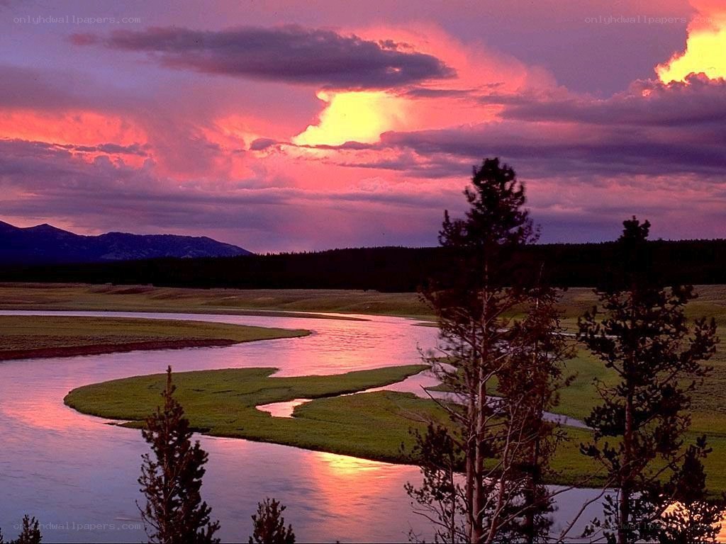 river at sunset with pink sky