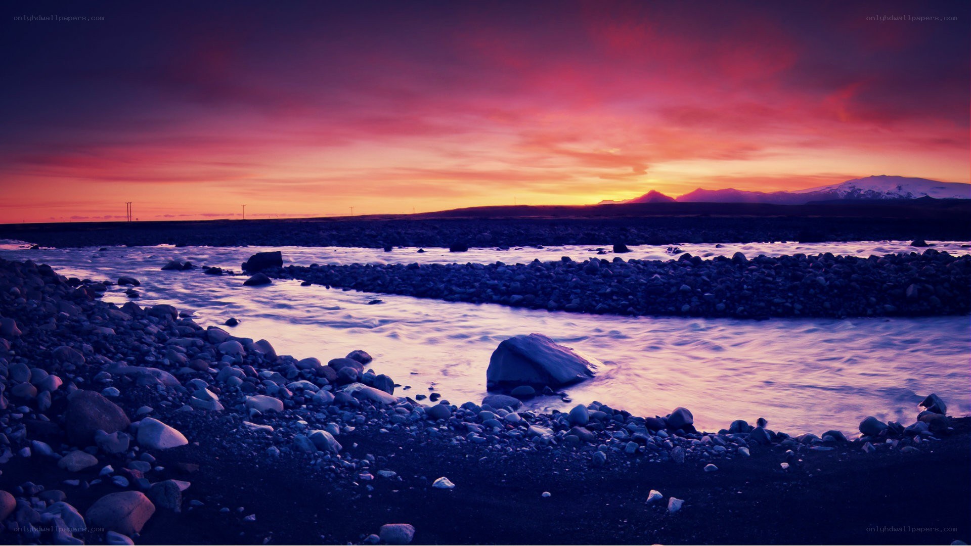 River at sunset with purple sky
