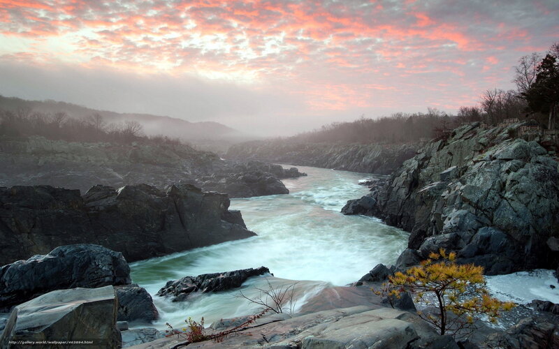 River at sunset with rocky cliffs