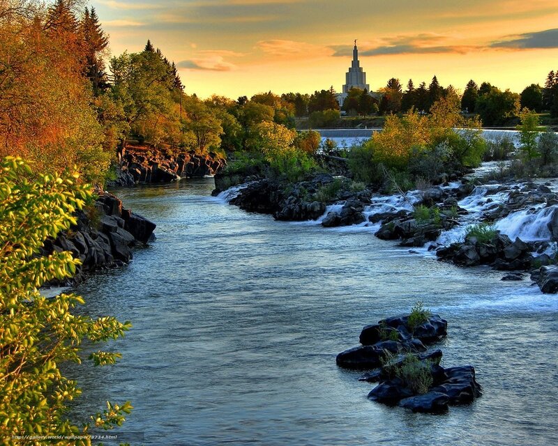River at sunset with temple