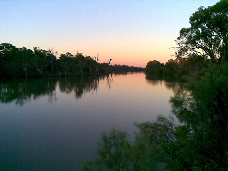 river at sunset with trees