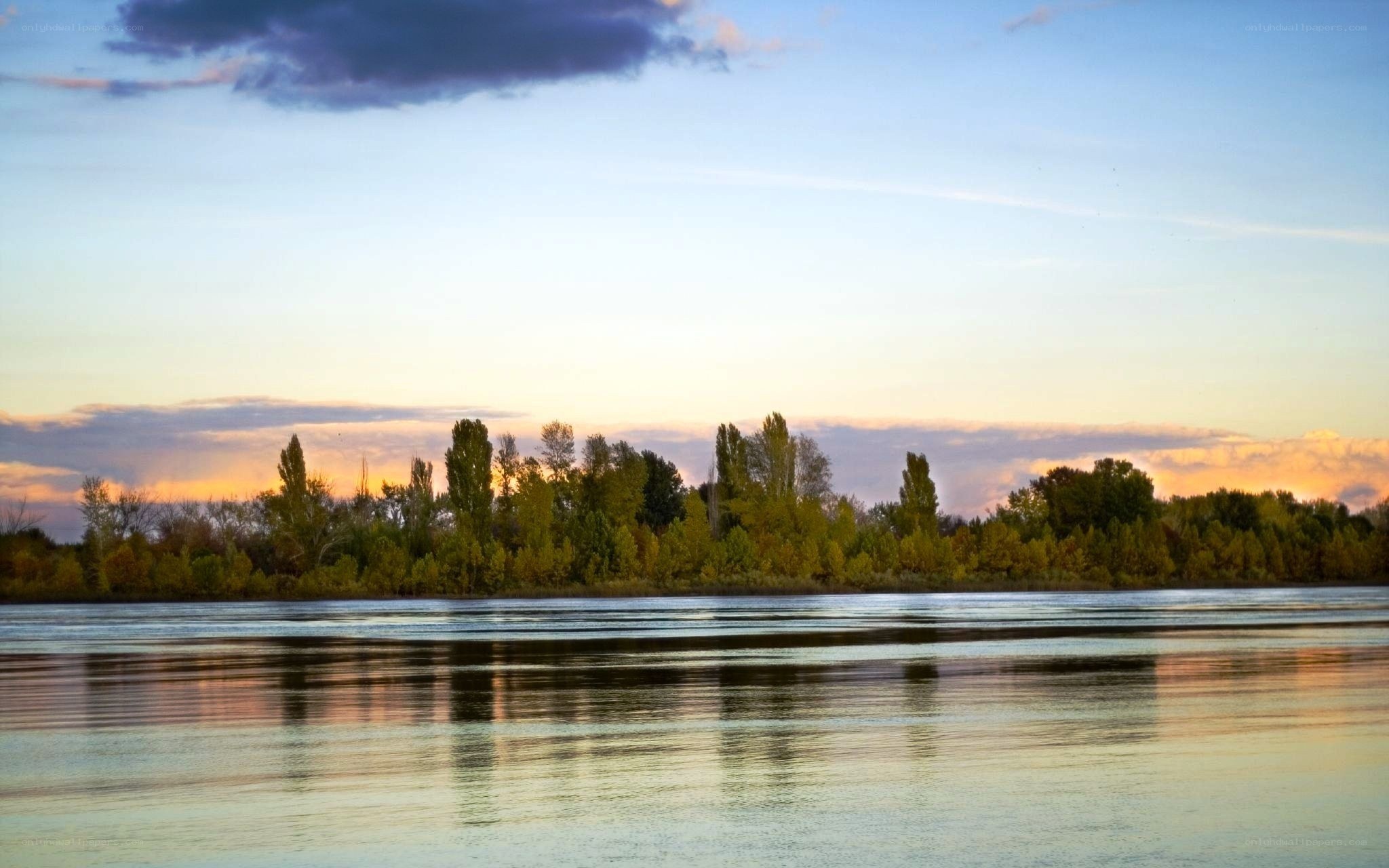 River at sunset with trees
