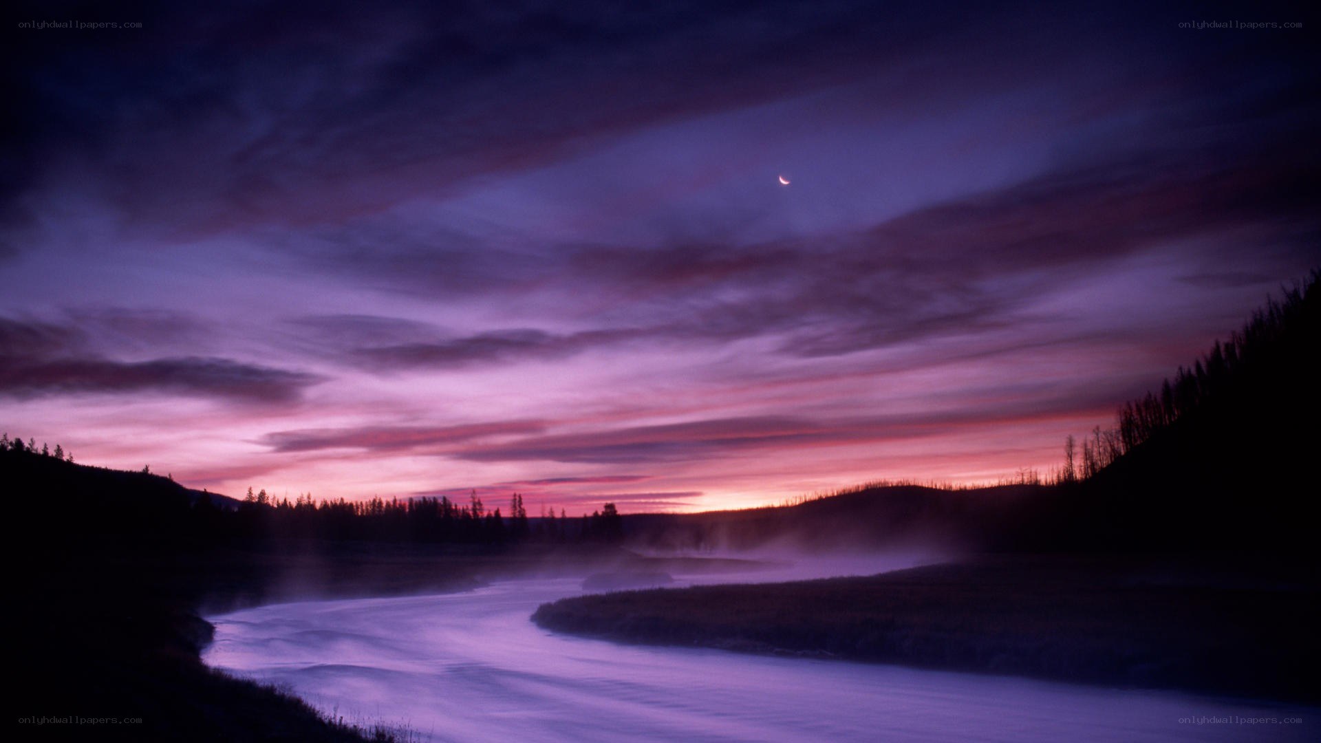 River at twilight with crescent moon