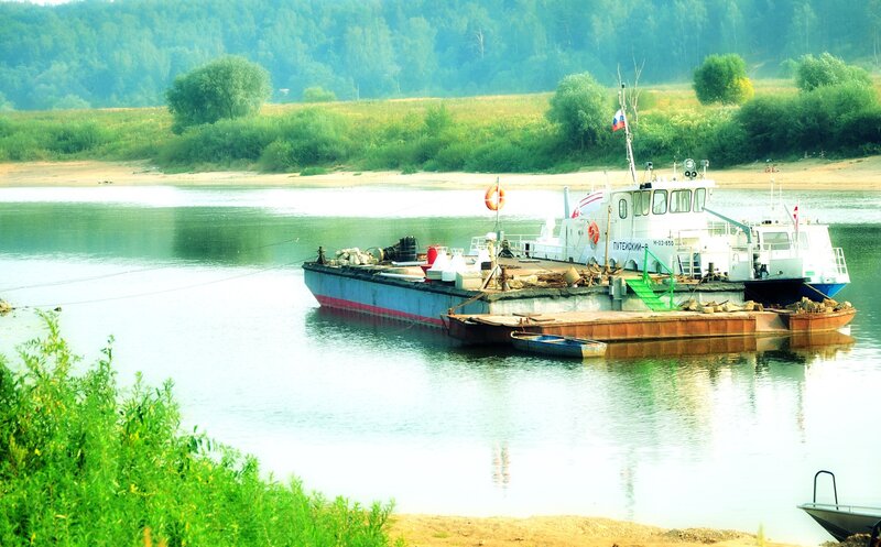 River barge with tugboat