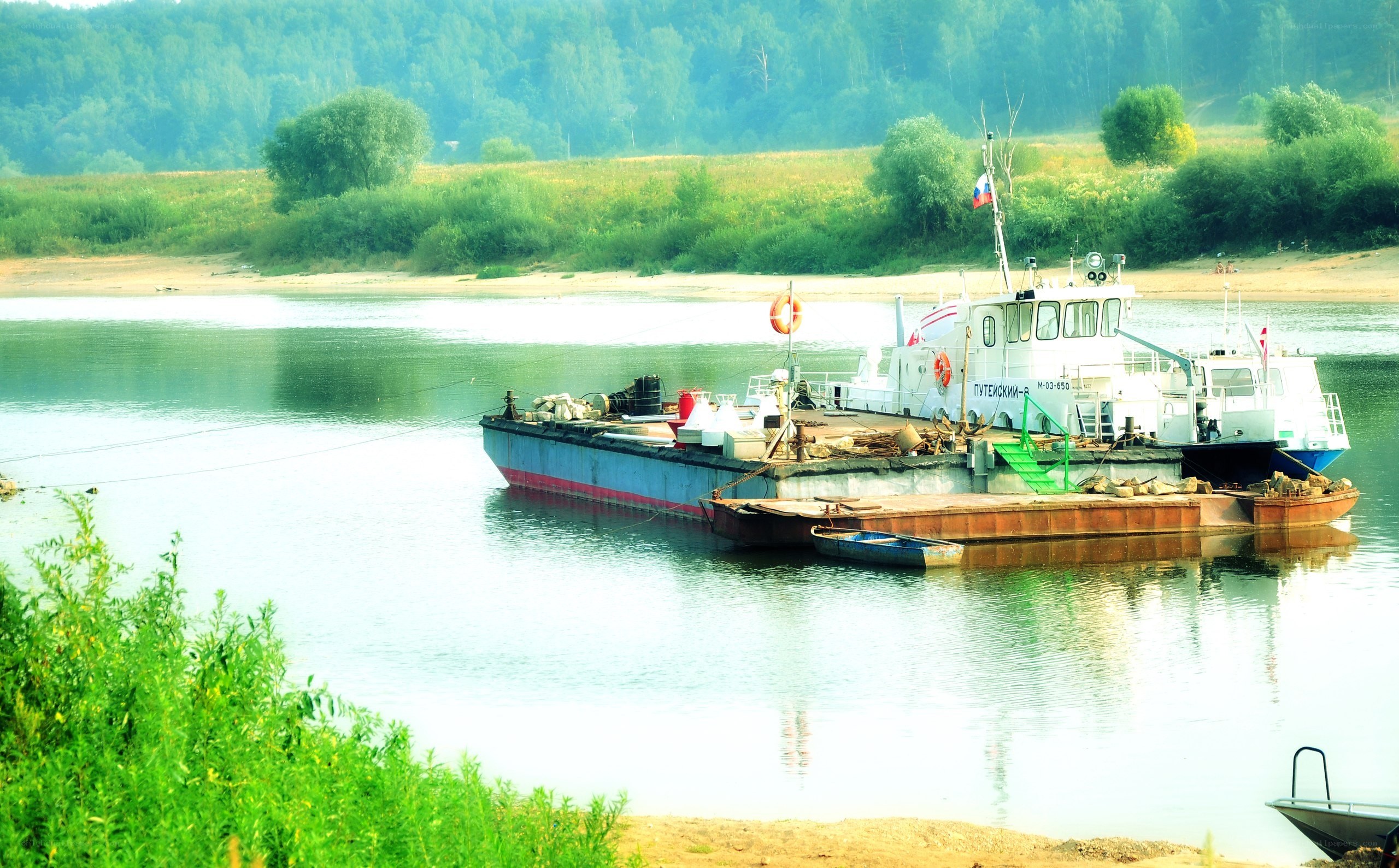 River barge with tugboat
