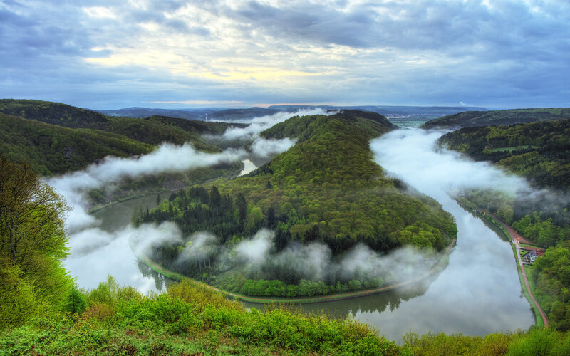 River bend in misty valley