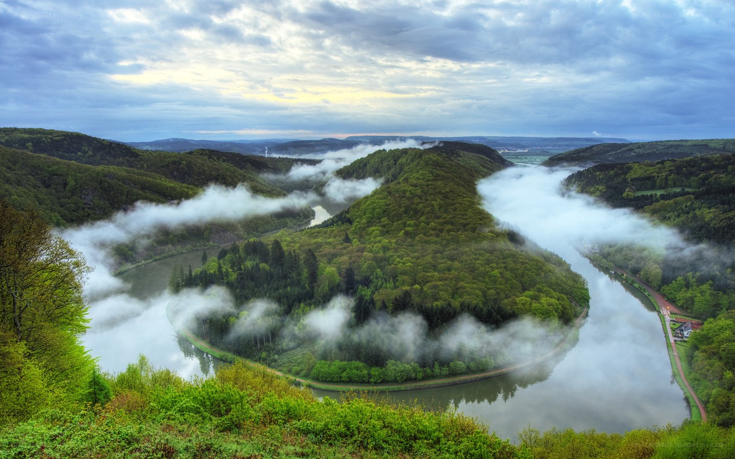 River bend in misty valley