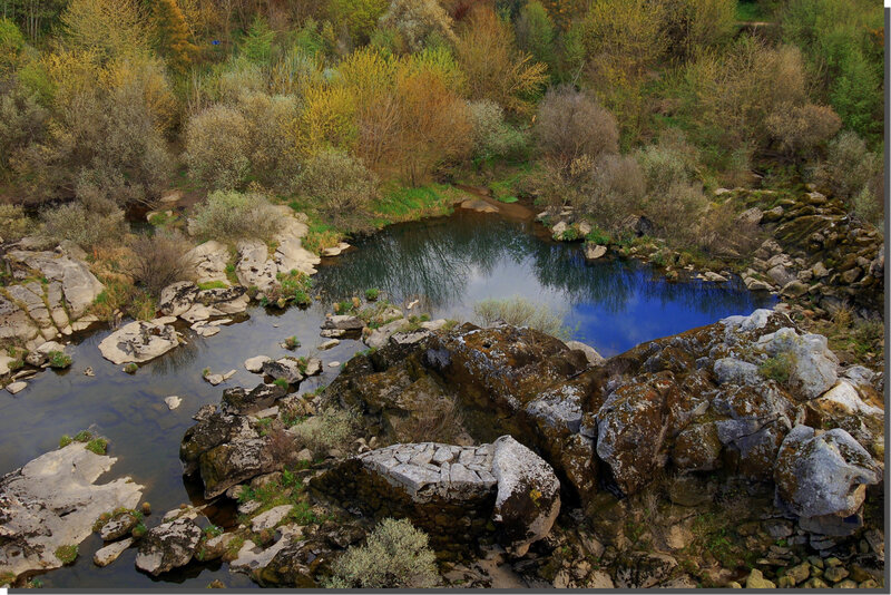 River bend with mossy rocks