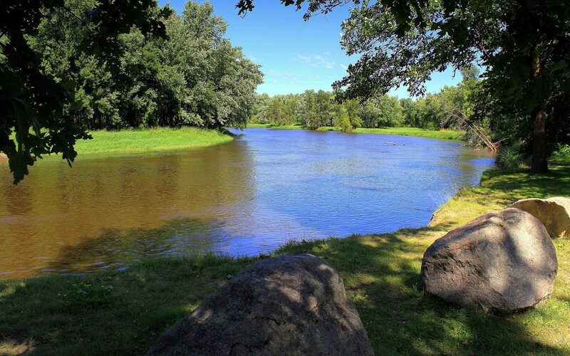 River bend with trees and rocks