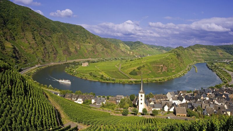 River bend with vineyards and village