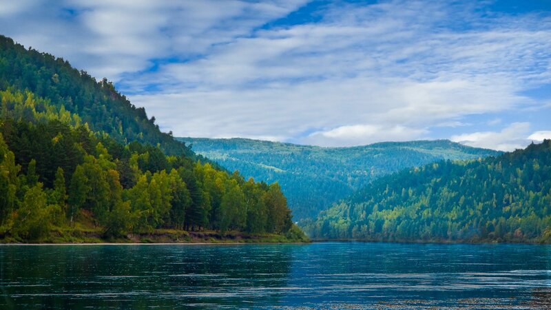 River Between Forested Hills — Blue