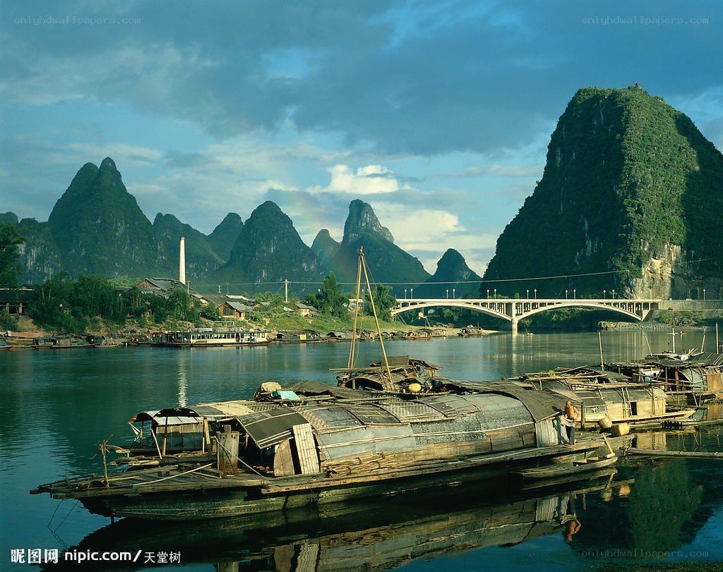 River boats in karst landscape