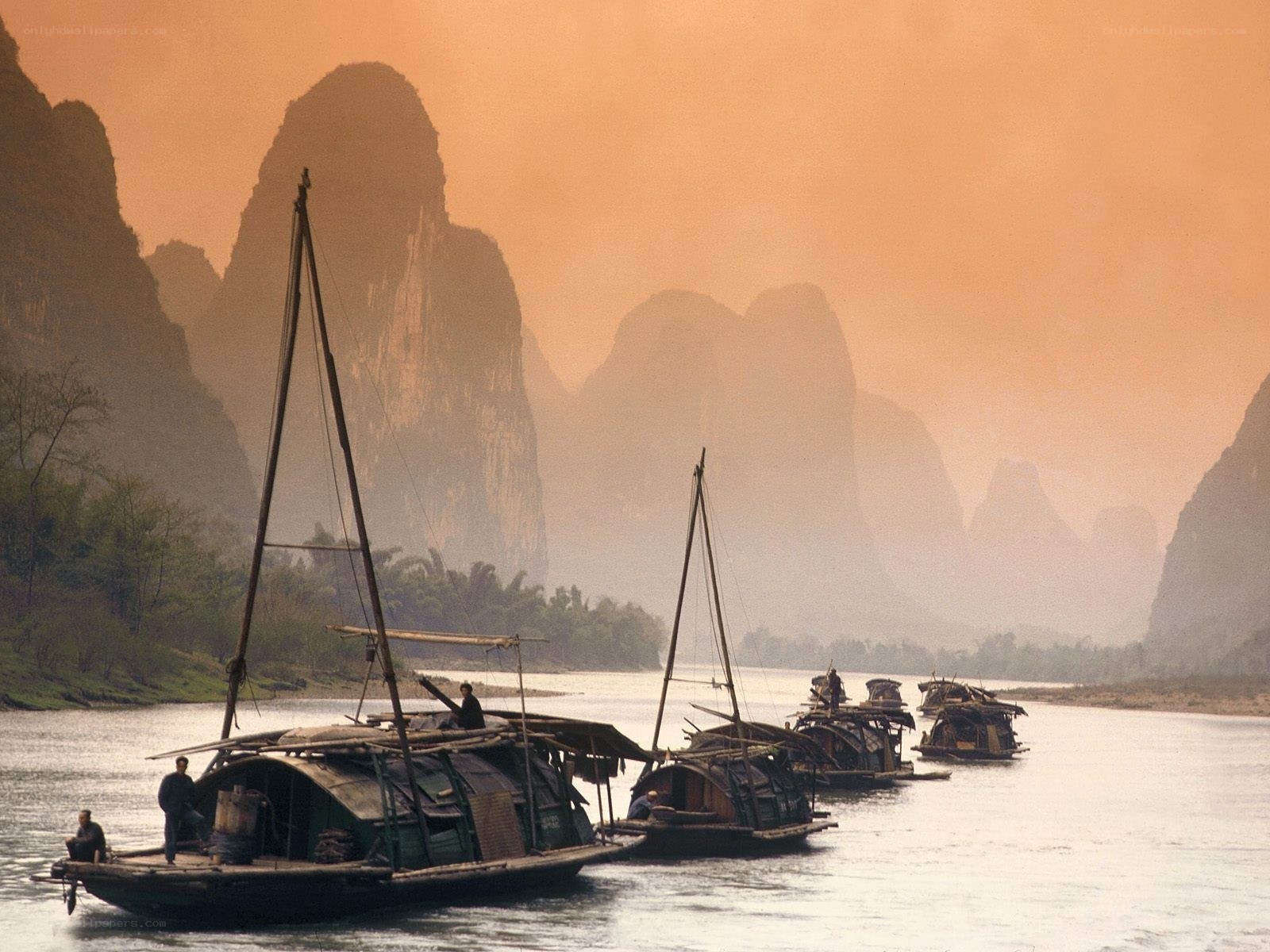 River boats in karst landscape