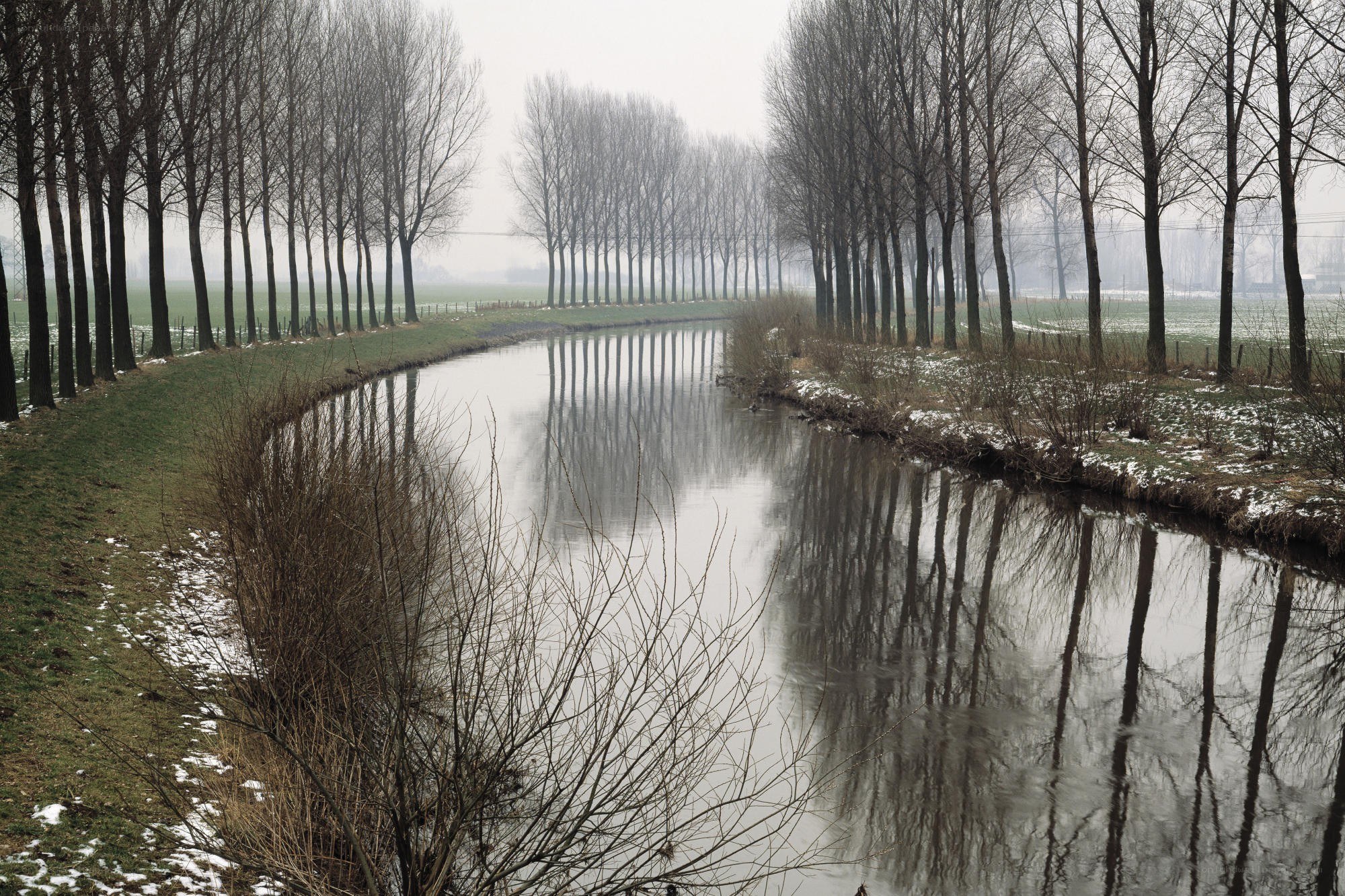 River canal in winter landscape