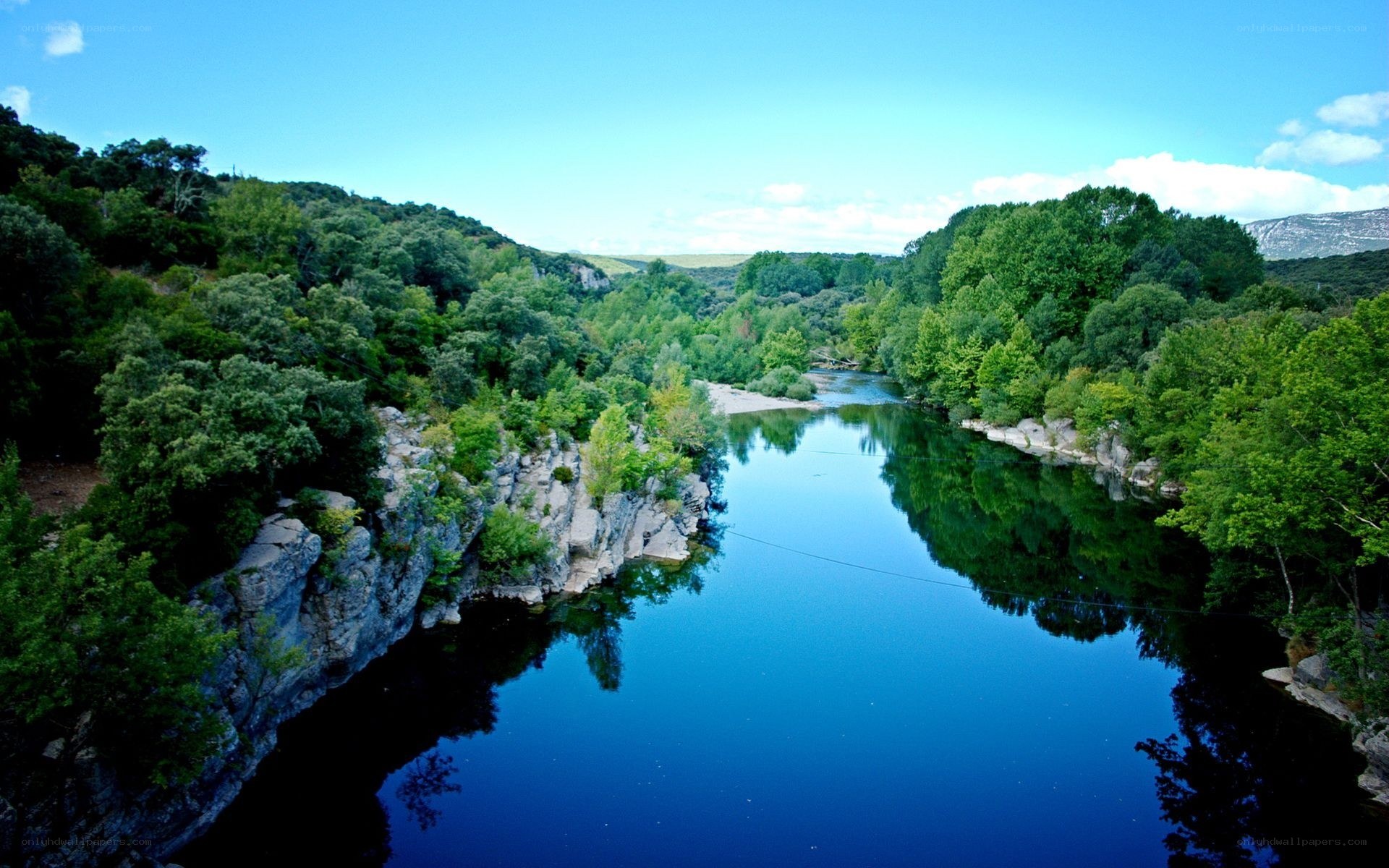 river canyon with lush greenery