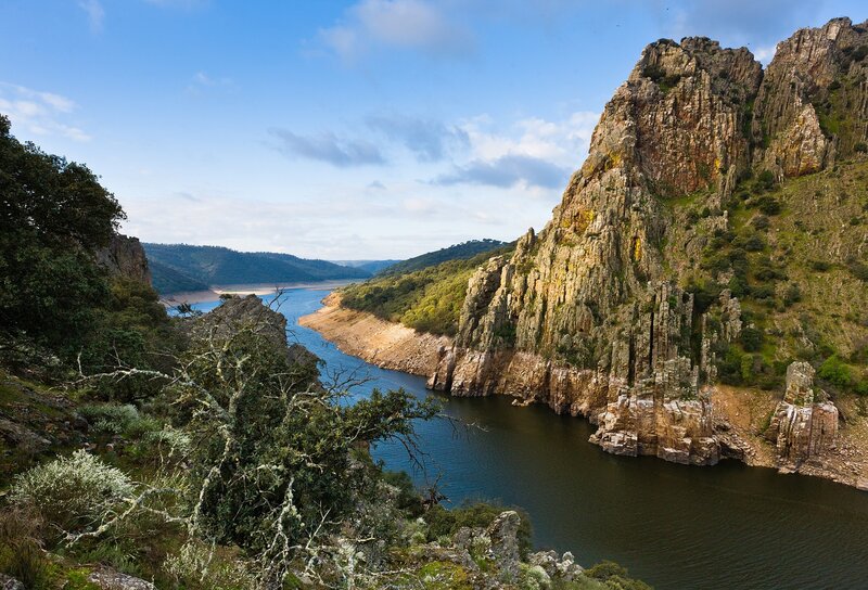river canyon with rocky cliffs