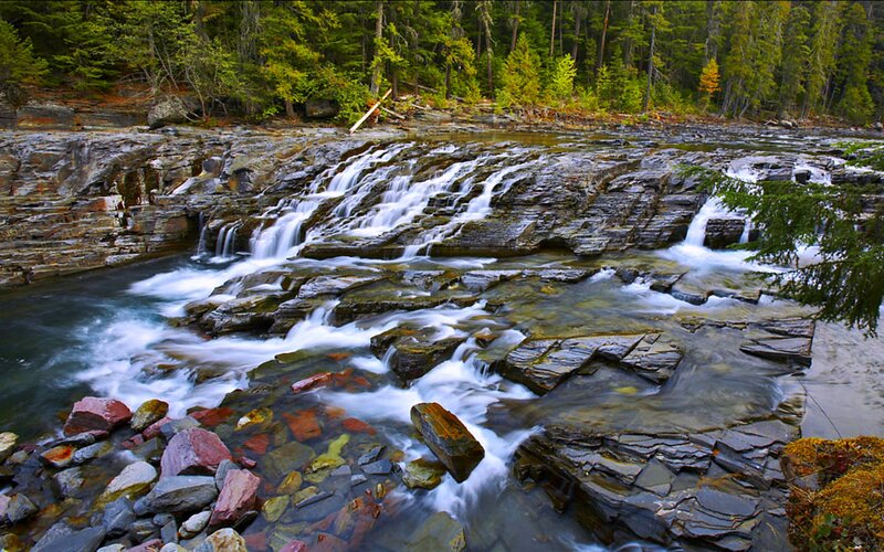 River Cascading over Rocks — Green