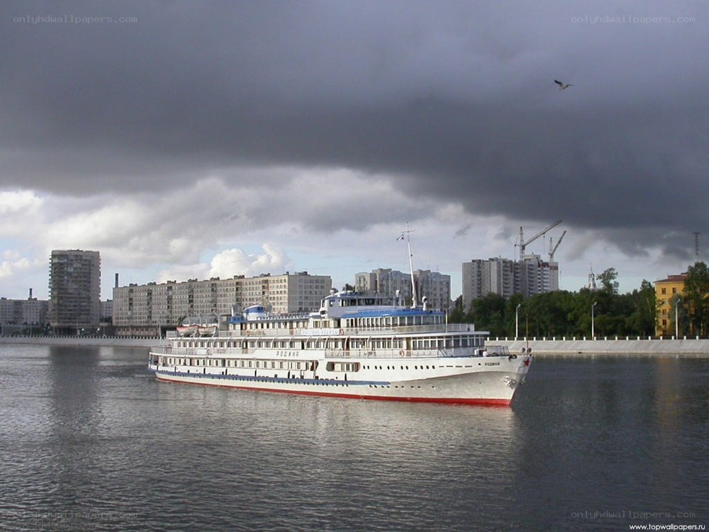 River cruise ship in city