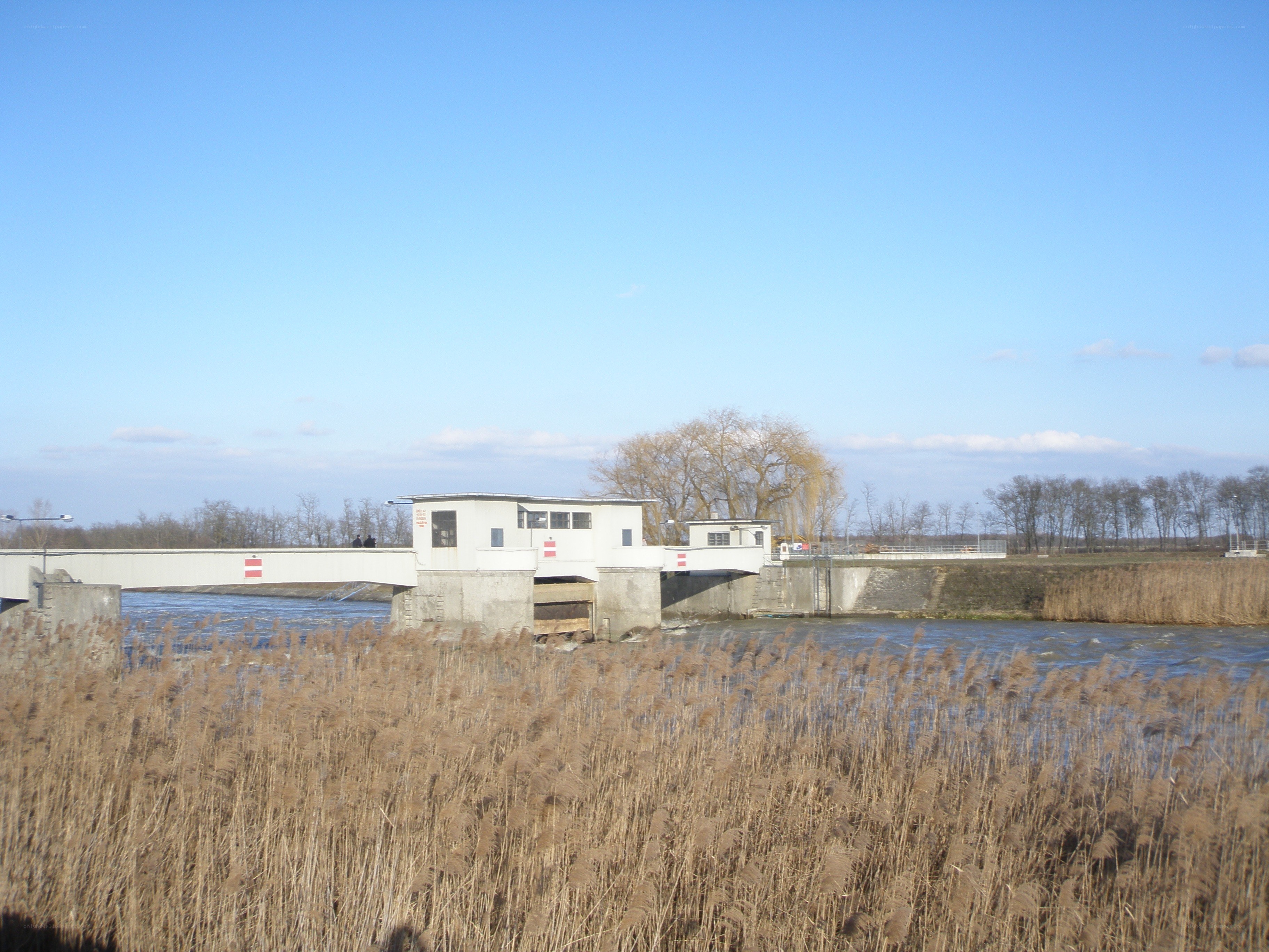 River dam with control building