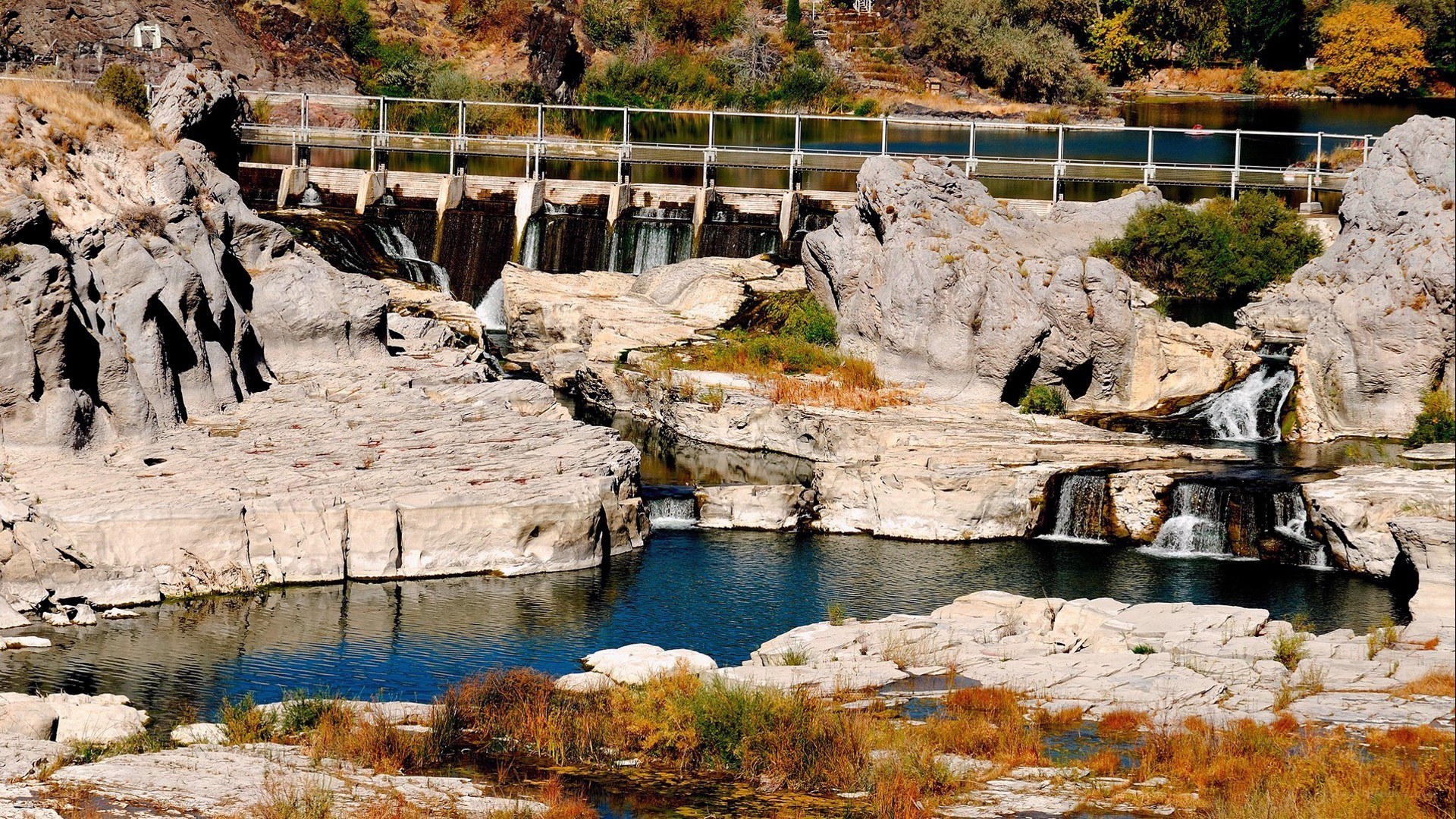 River dam with waterfalls