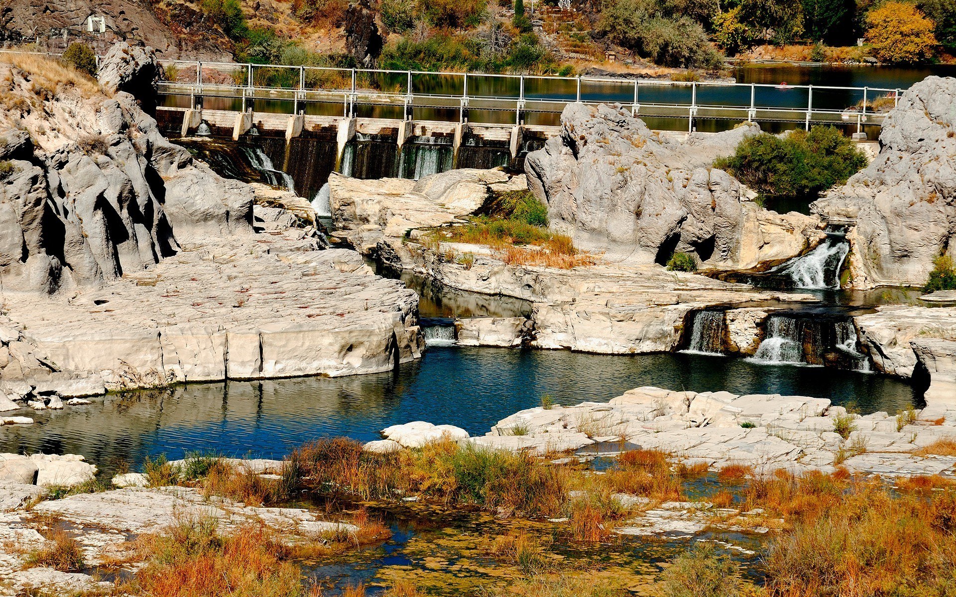 River dam with waterfalls