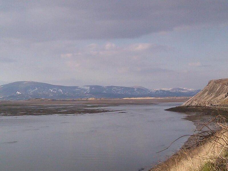 River Estuary with Mountains