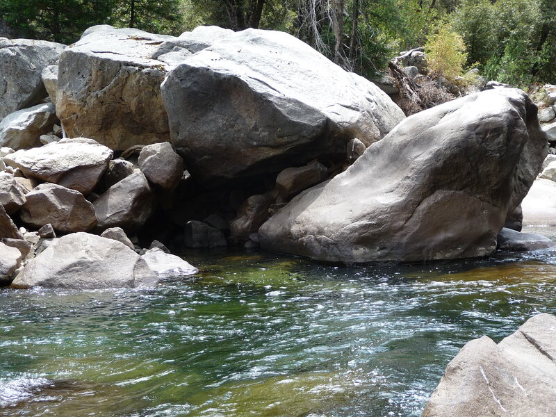 River Flowing Around Rocks