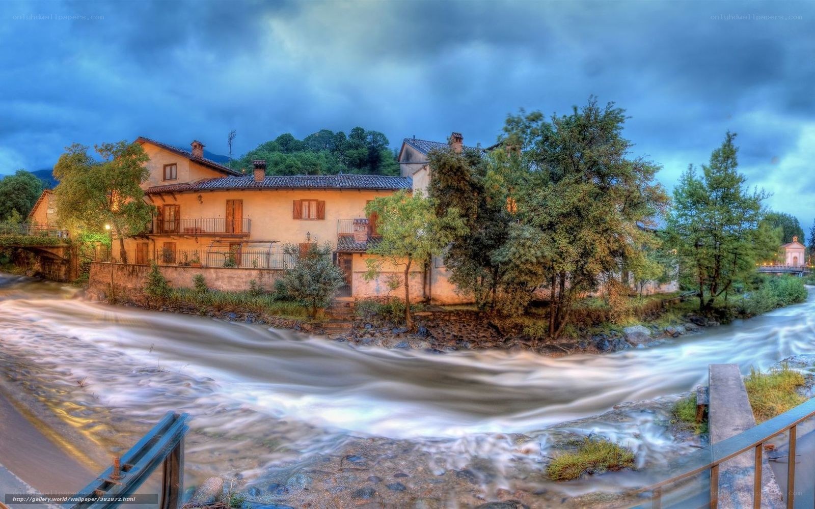 River flowing by village house