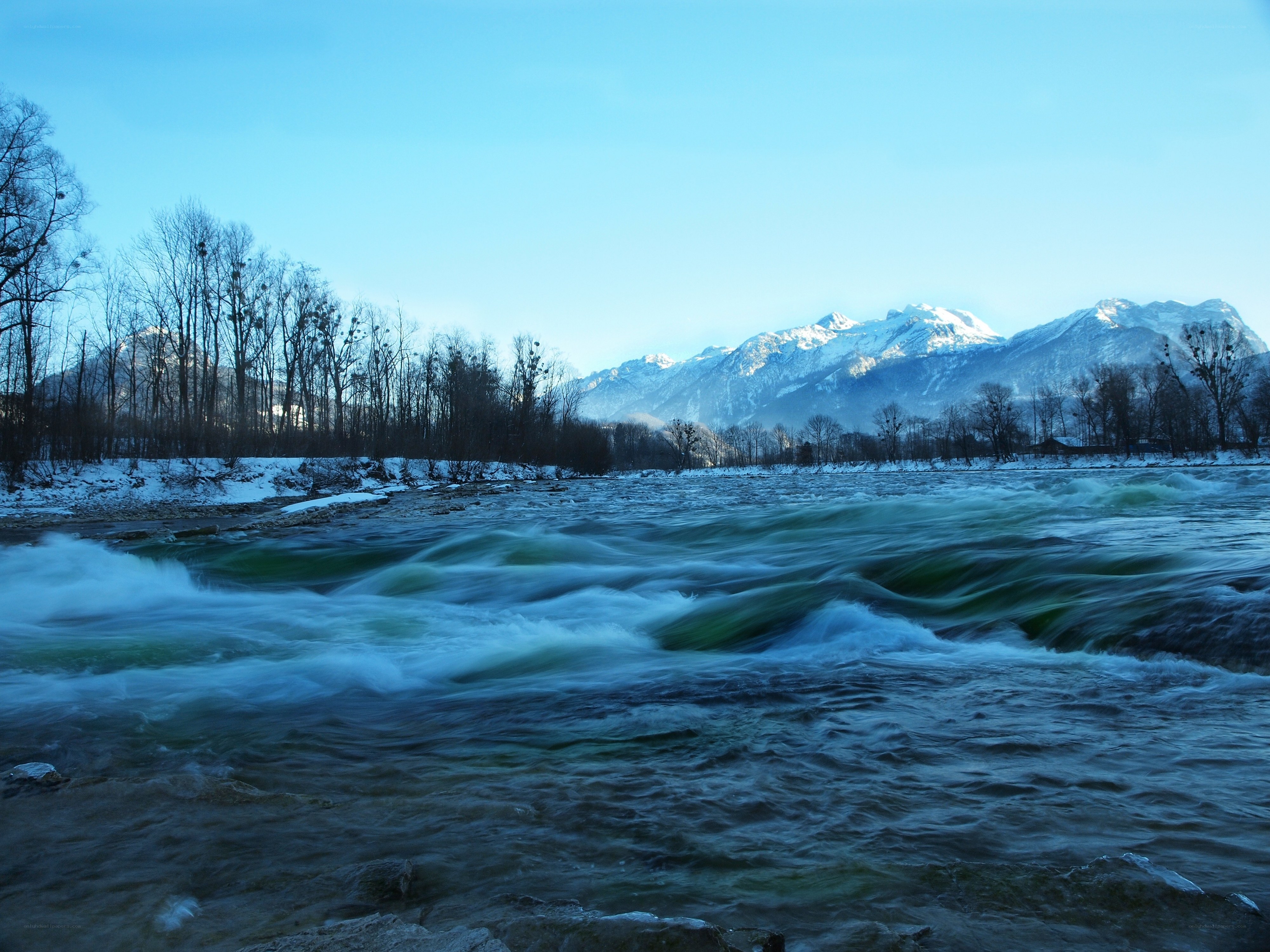 River flowing in winter landscape