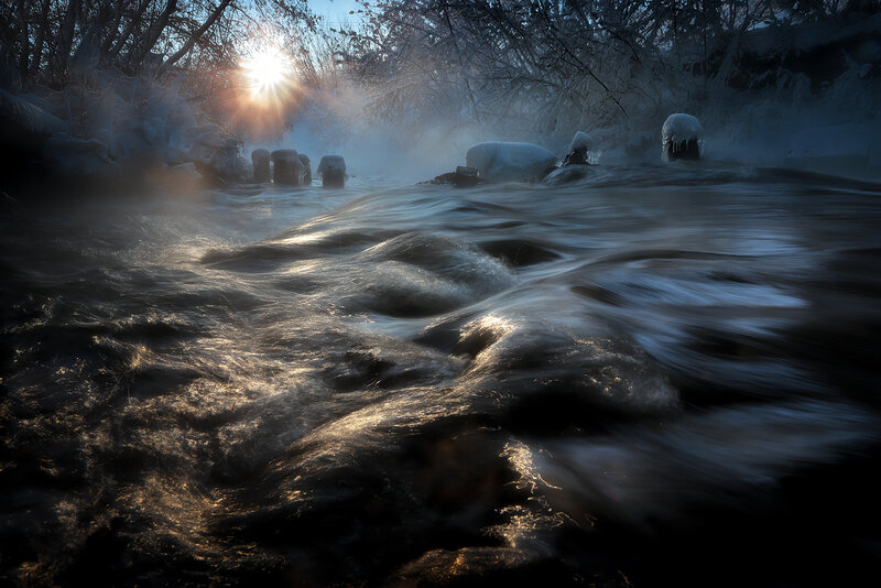 River Flowing in Winter