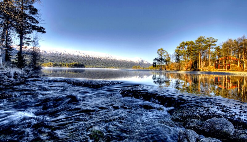 River Flowing into Lake — Blue, Serene