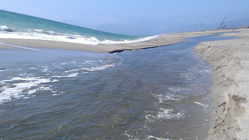 River Flowing into Ocean — Blue