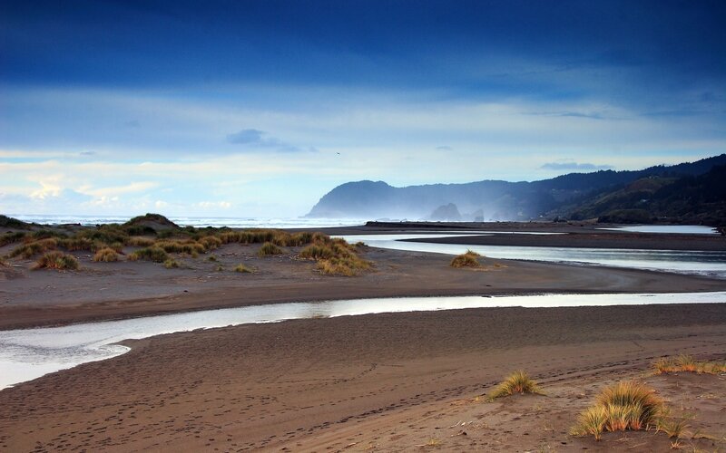 River flowing into the ocean