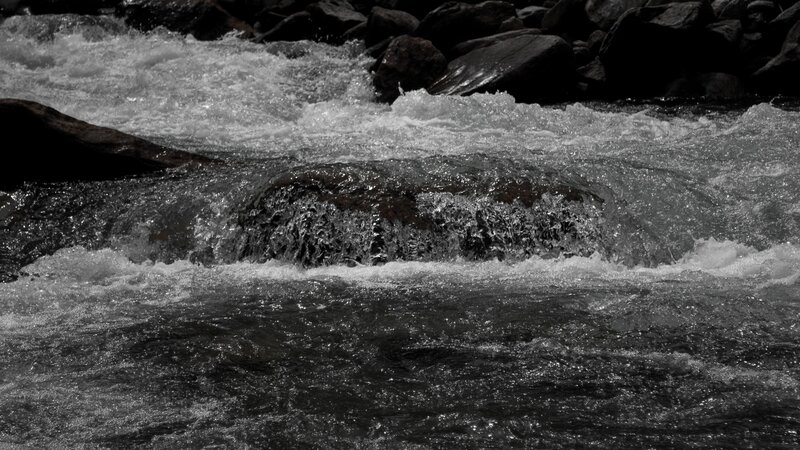 River Flowing over Rocks — Black, Dynamic