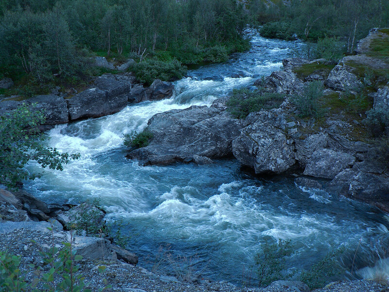 River Flowing over Rocks — Blue, Calm