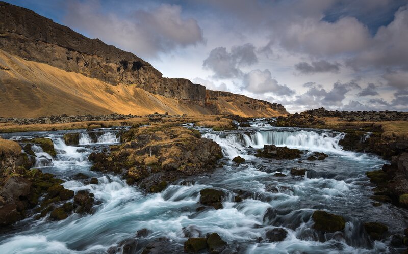 River Flowing over Rocks — Blue, Dramatic, Afternoon, Photograph, Mountain