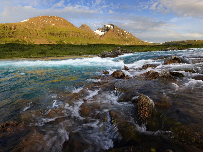 River Flowing over Rocks — Blue, Serene, Afternoon, Photograph, Mountains, Sky